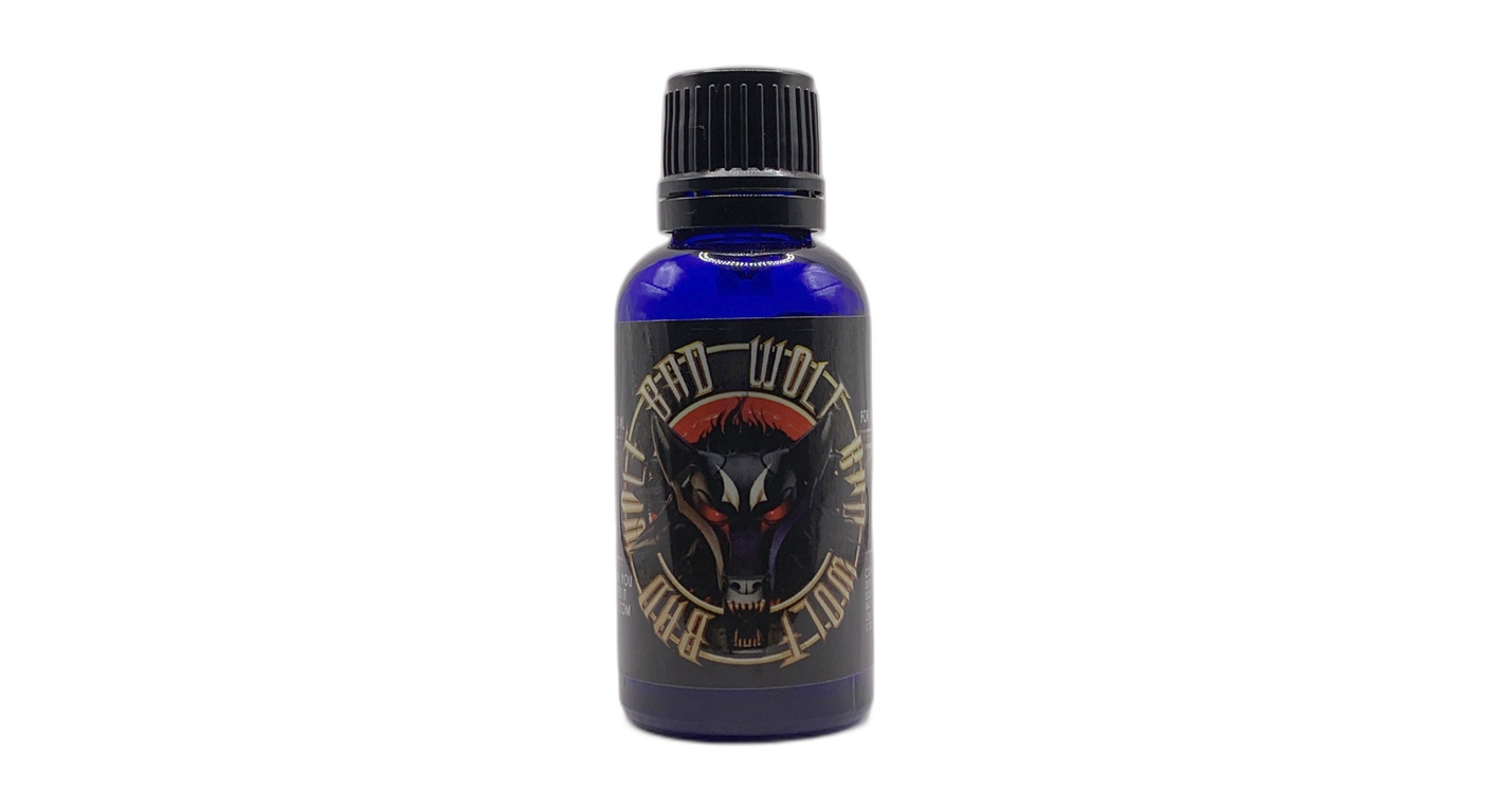 Bad Wolf pheromone cologne by Liquid Alchemy Labs — cobalt blue 30ml bottle with the Bad Wolf label